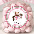 Pink cowgirl birthday sticker with girl riding white horse