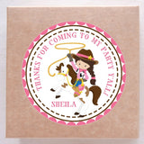 Pink cowgirl with lasso riding horse sticker