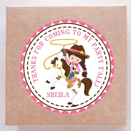 Pink cowgirl with lasso riding horse sticker