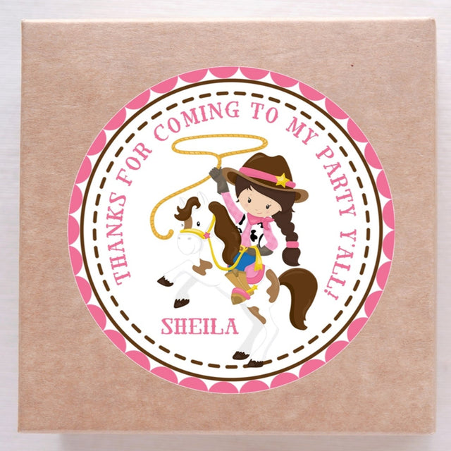 Pink cowgirl with lasso riding horse sticker