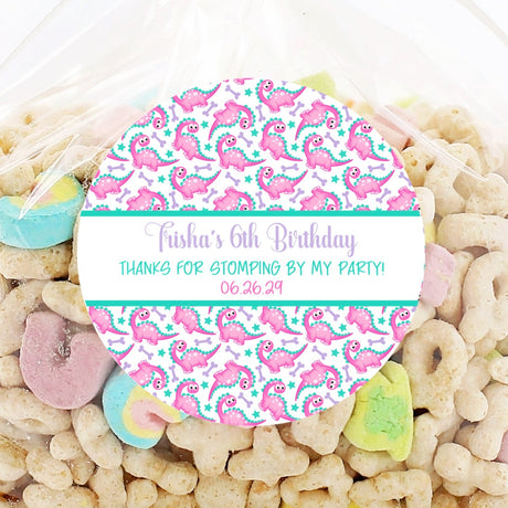 Pink dinosaur birthday sticker with bones and stars