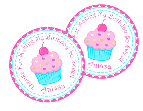 Pink frosting cupcake birthday sticker with teal wrapper