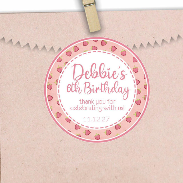 Pink strawberry birthday sticker with berry border