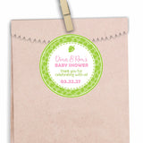 Pink tropical leaf baby shower sticker with green leaf background