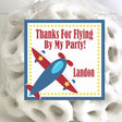 Red and blue airplane birthday sticker personalized for party favors