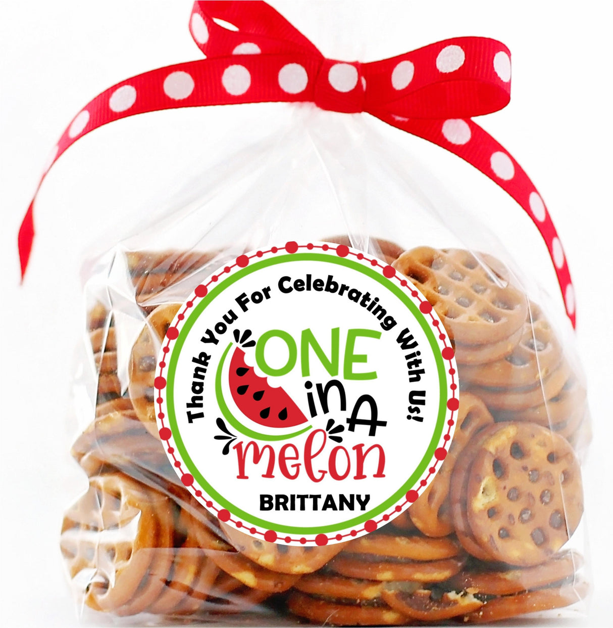 Red and green One in a Melon birthday sticker with child’s name