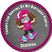 Round party favor label with a girl on a skateboard, pink border, and text.