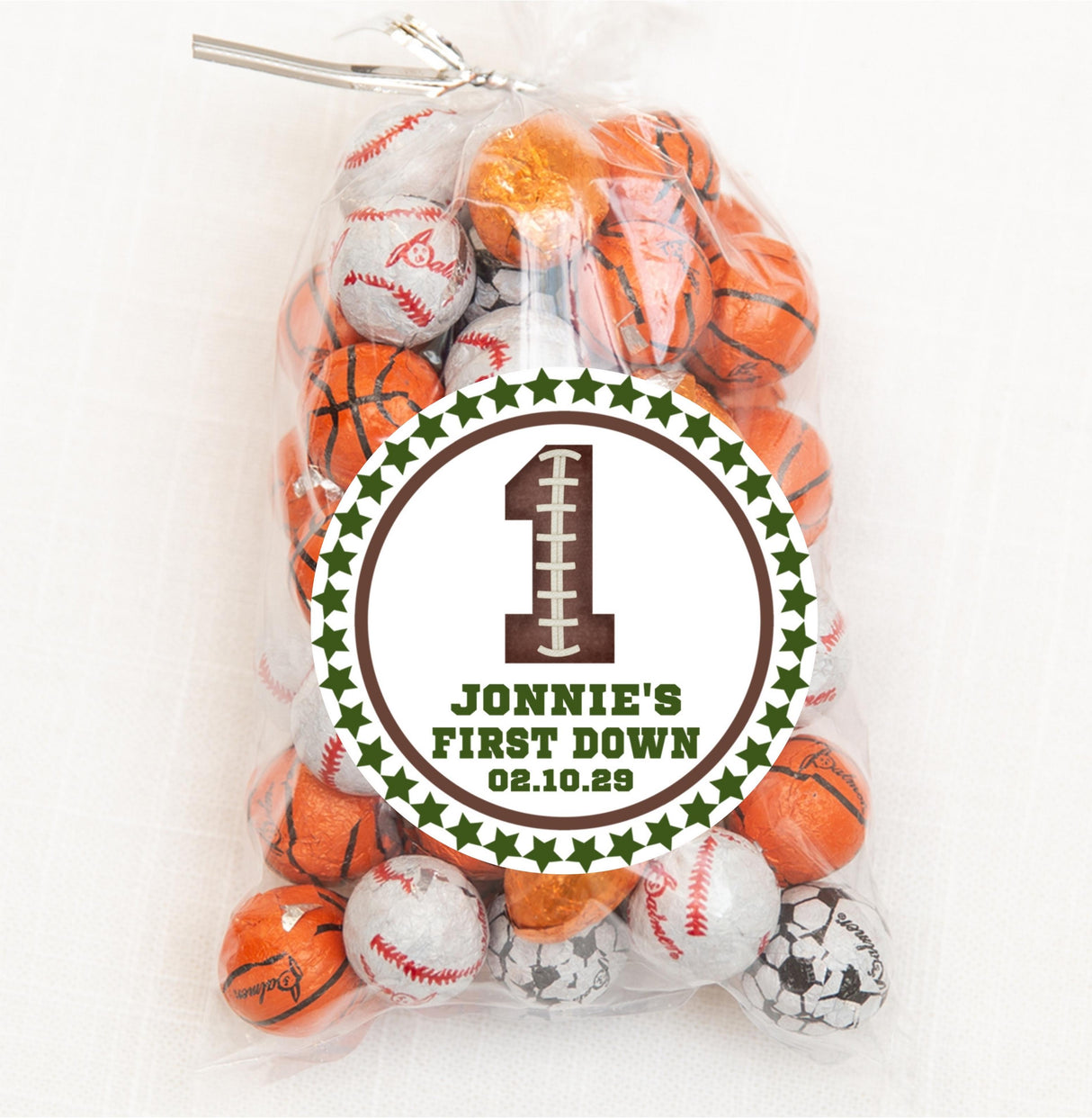 Sports-themed first birthday sticker with star border