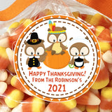 Thanksgiving sticker with three owls dressed in fall outfits around pumpkin