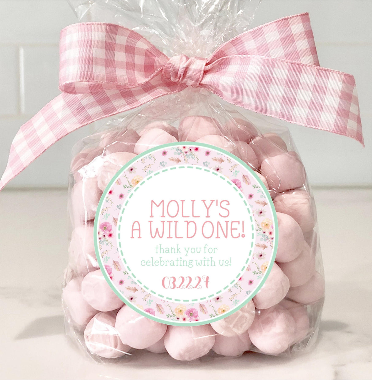 Watercolor floral party favor label with feathers