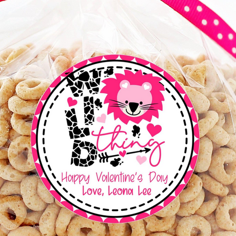 Wild Thing Valentine sticker with pink lion and leopard heart design