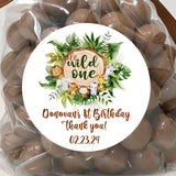 Wild one safari animals first birthday sticker design with tropical leaves