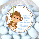 blue monkey baby shower sticker with monkey swinging on vine