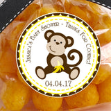 brown monkey baby shower sticker with banana and yellow border