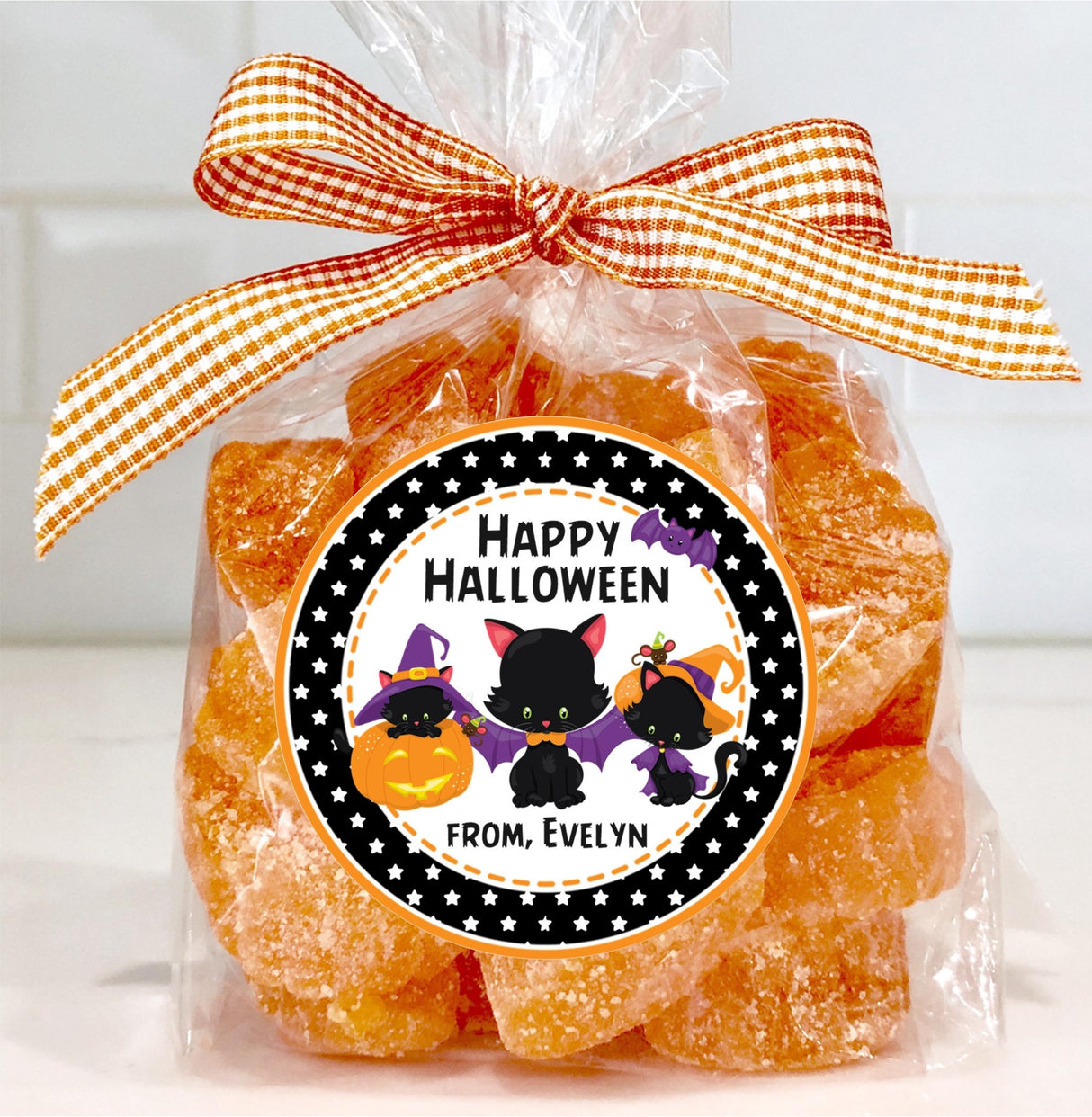 cute cat themed halloween party sticker with orange and purple accents