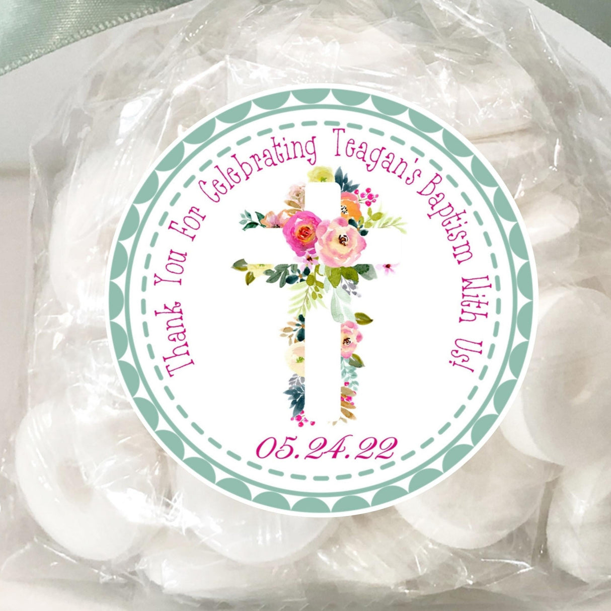 green floral baptism sticker with white floral cross