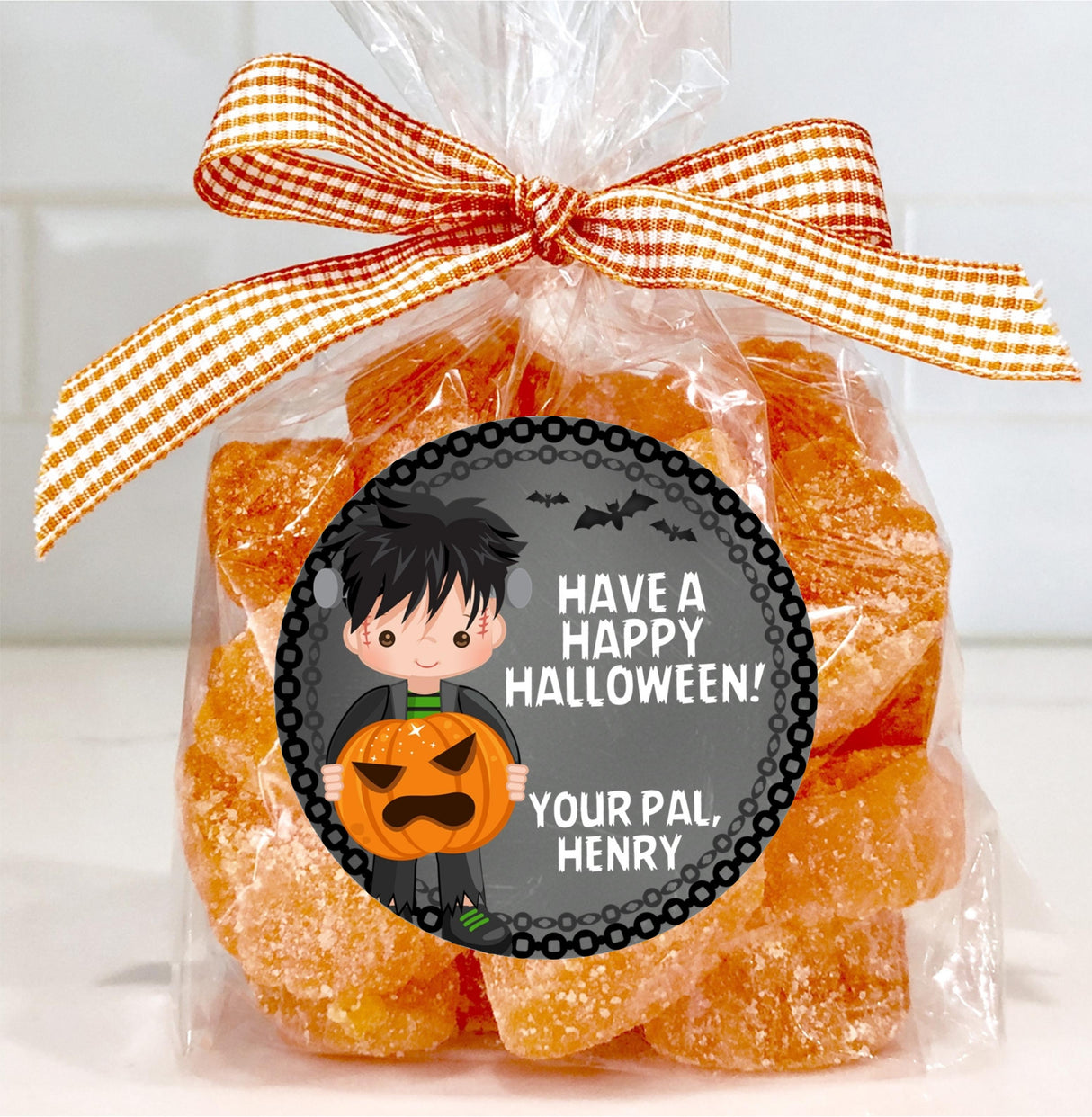 kids halloween party sticker with monster and pumpkin design