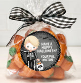 kids halloween party sticker with skeleton and candy design
