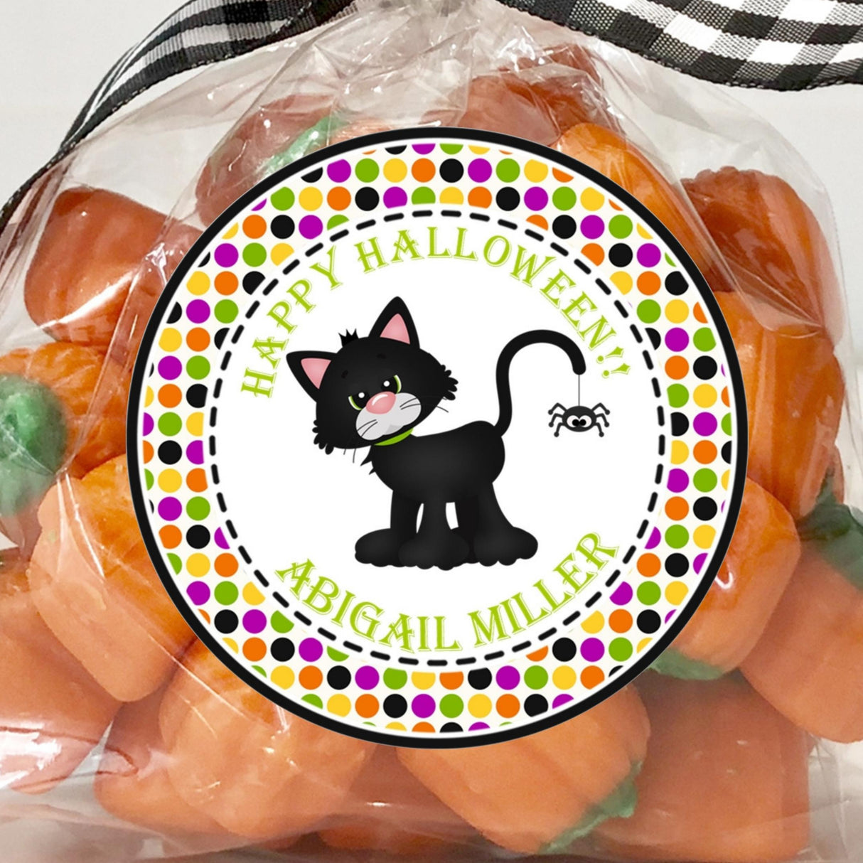 personalized black cat halloween sticker with colorful polka dot border