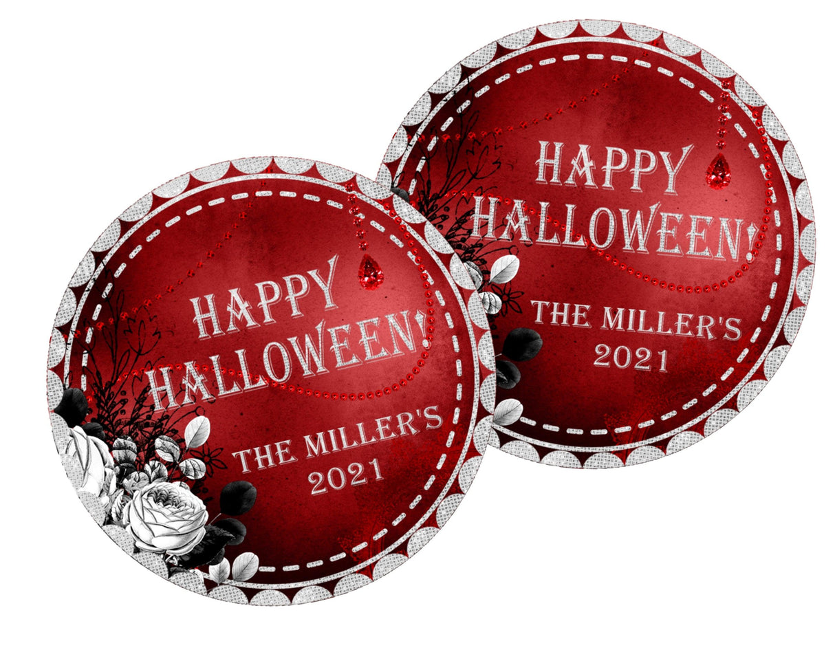personalized halloween favor label featuring black and white flowers on red base