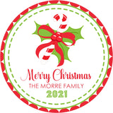 red candy cane christmas sticker with holly and ribbon