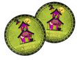 round halloween sticker showing haunted house illustration with spooky accents