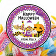 round halloween sticker with pastel candy illustrations and cheerful accents