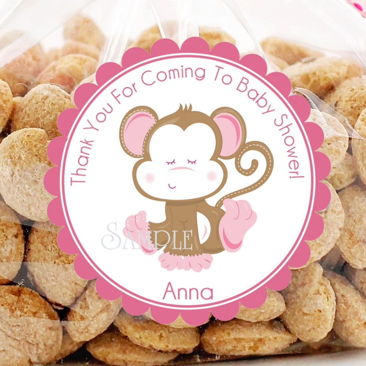 sleeping monkey baby shower sticker with pink border