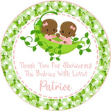 Brown-skinned twin girl pea pod baby shower sticker with green plaid border
