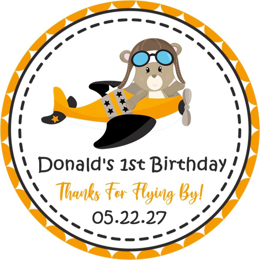 Orange and black aviation party favor label