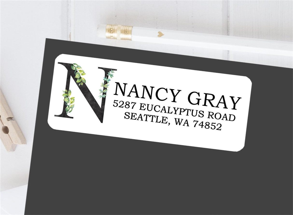 Personalized initial return address labels with greenery design