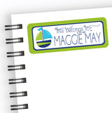 Personalized sailboat school supply label in green and blue