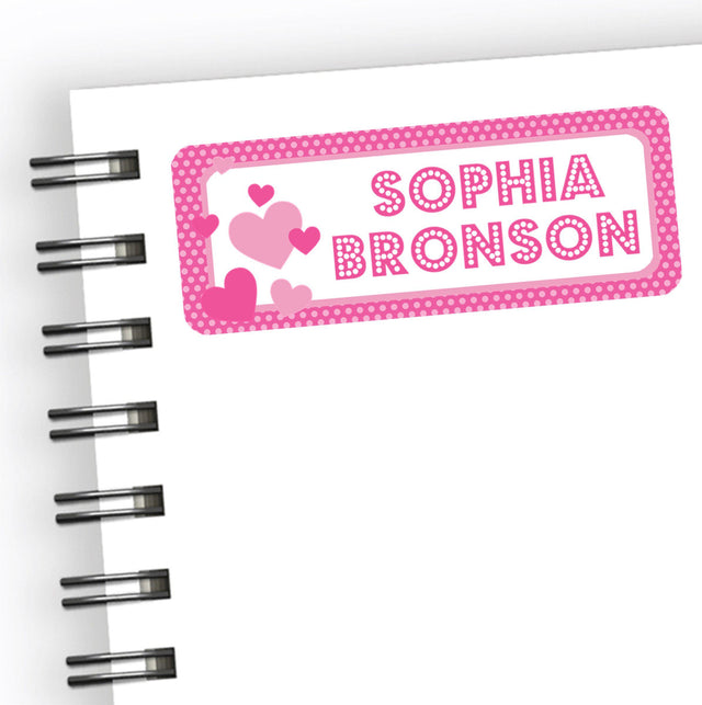 Pink heart school name labels with layered hearts and polka dot border