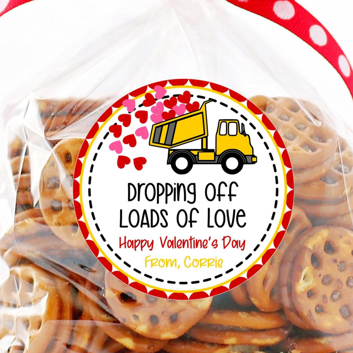 Yellow dump truck Valentine sticker dropping red hearts