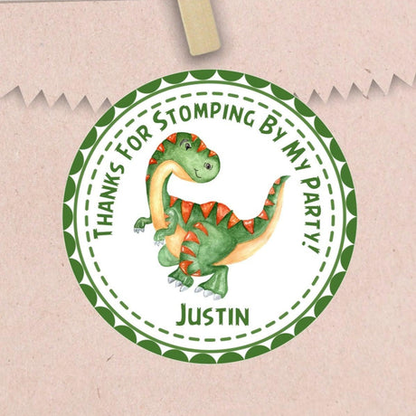 green dinosaur birthday sticker with orange spikes